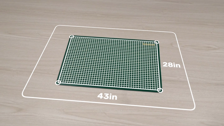 A cutting mat positioned inside the projector calibration area